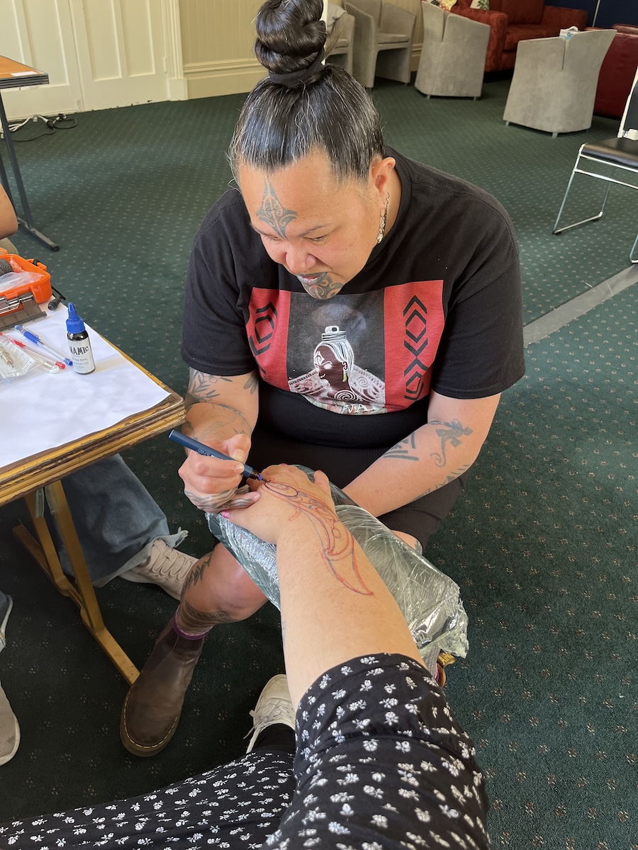 Tā moko demonstration by Christine Harvey